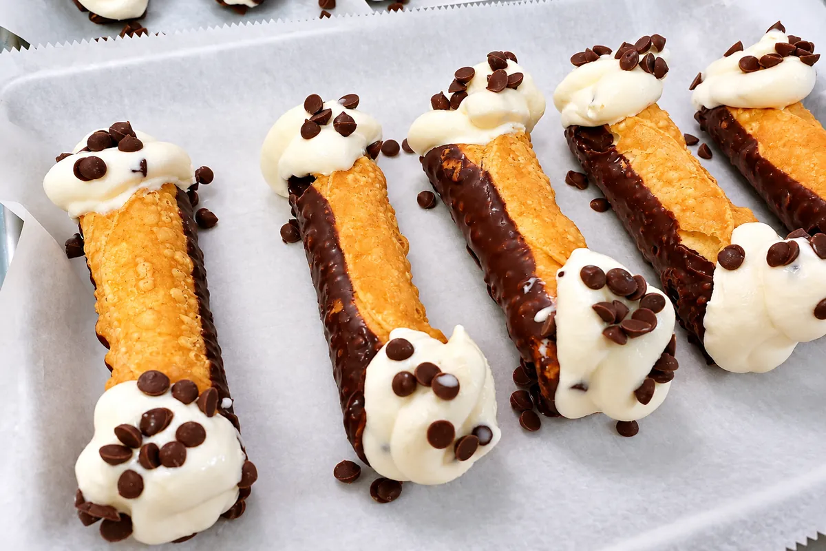 Cannoli dipped in chocolate with chocolate chips