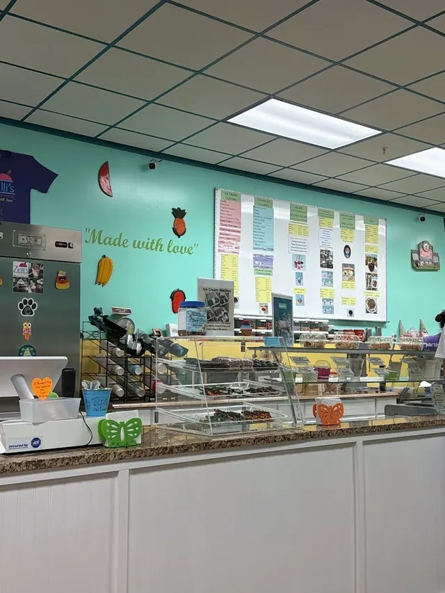 The shop counter with the menu board and the glass case